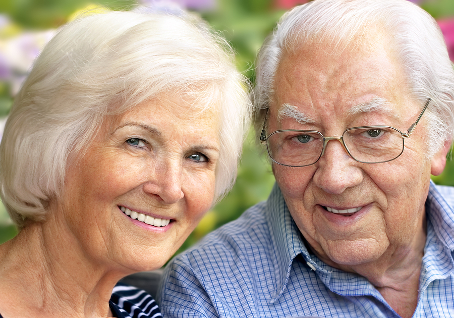 older couple outdoors smiling, Monmouth Junction, NJ dentures